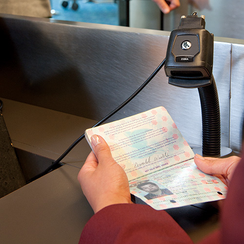 Fixed-mount scanner scanning passport