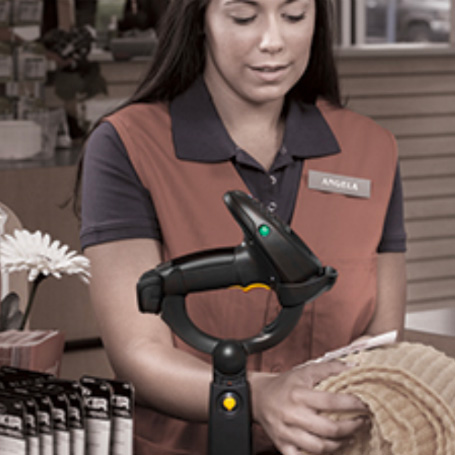 Rugged barcode scanner scanning retail product