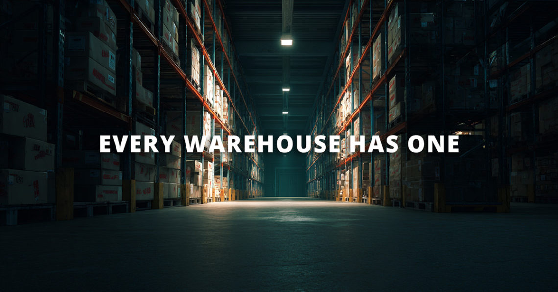 Dark warehouse with single light to signify the only place wifi works